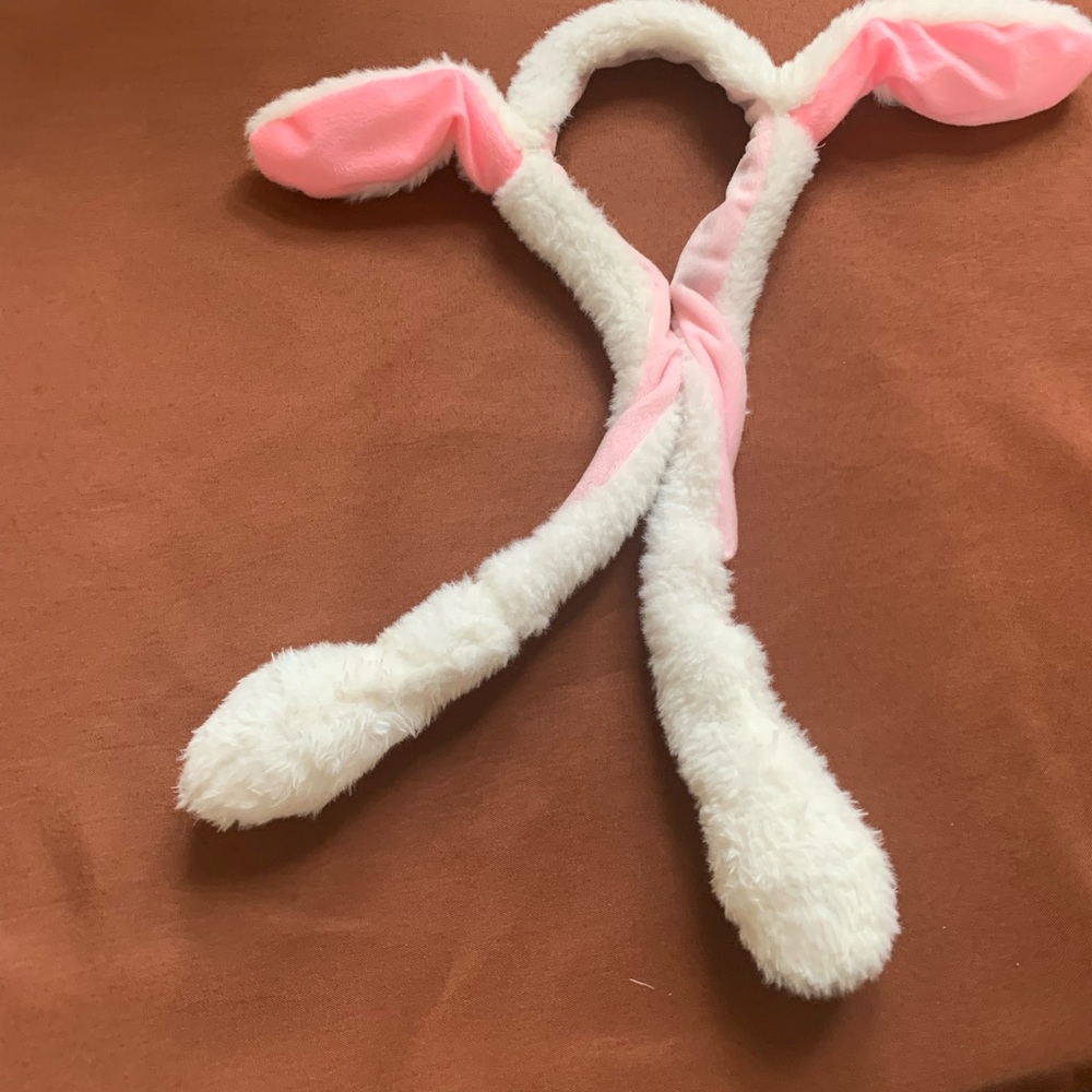 Bunny ear headband / ears popping up when pushing the paws women /girls